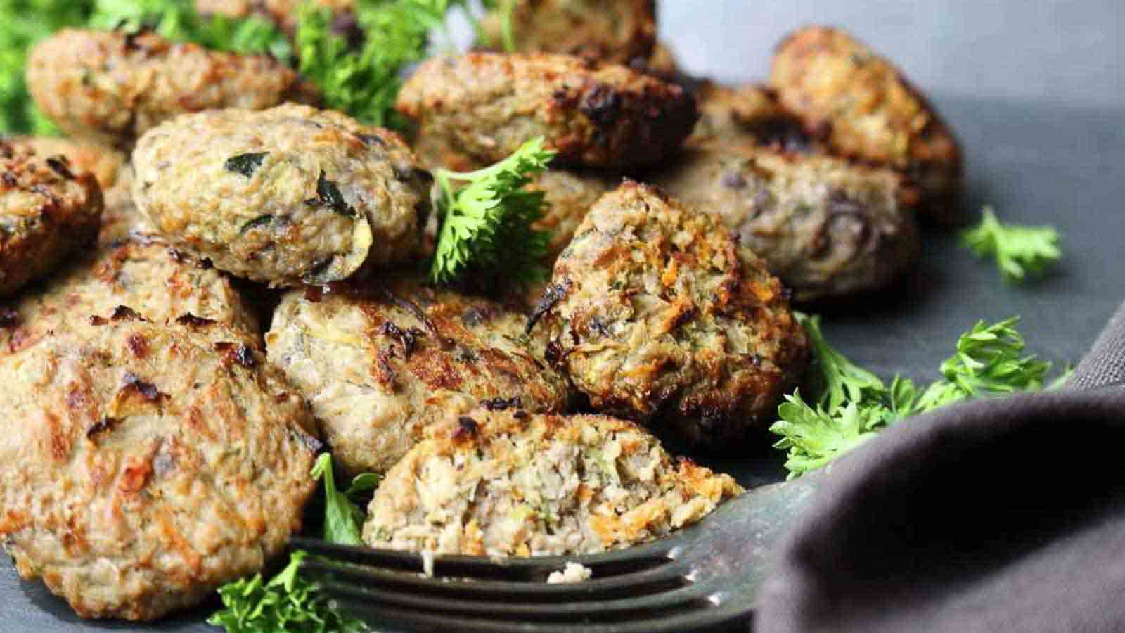 Mini burgers with parsley. 