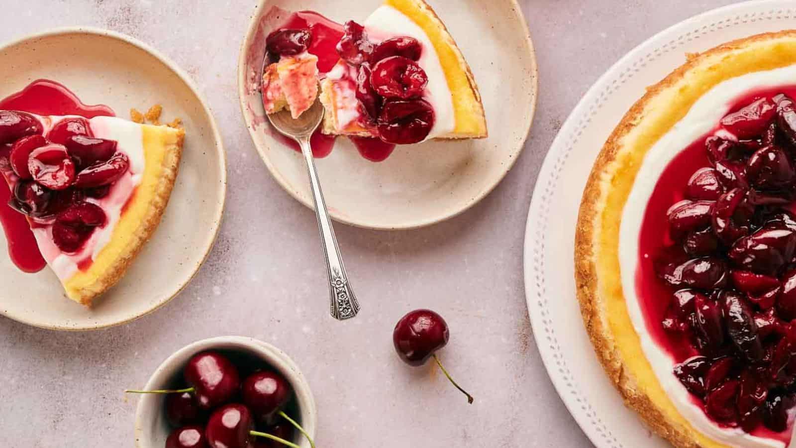 A slice of cherry cheesecake on a plate.