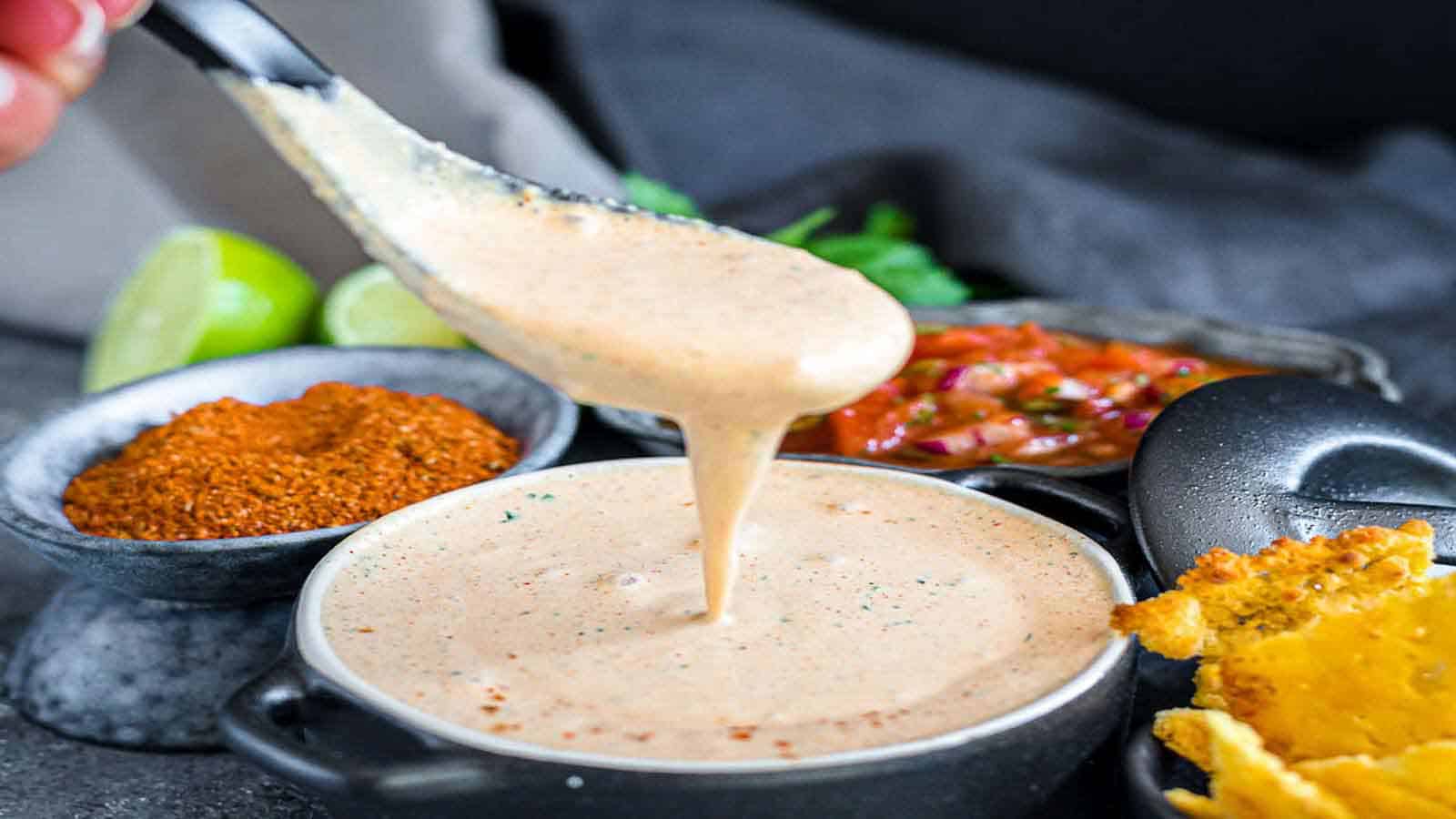 Easy Healthy Creamy Salsa Dressing on a spoon. 