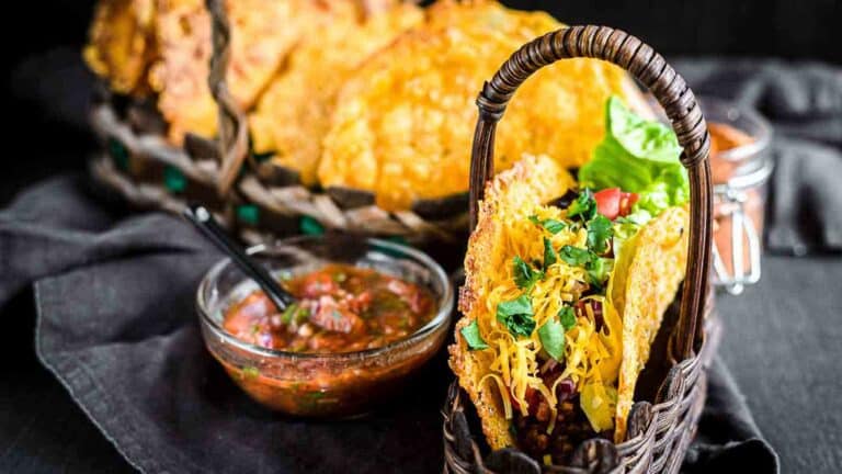 Tacos in a brown basket.