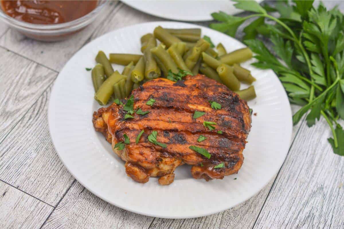 BBQ boneless chicken thighs on indoor grill.