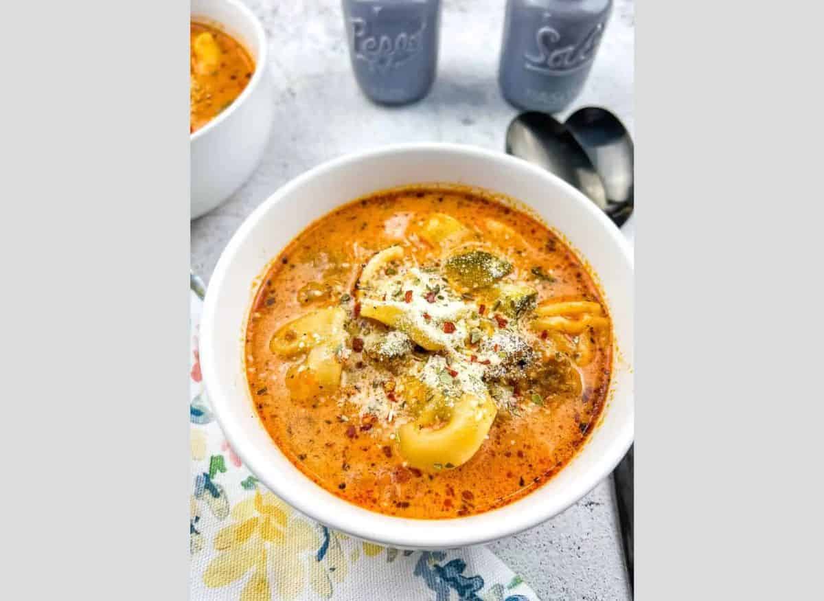 A bowl of Tortellini Soup with Sausage.