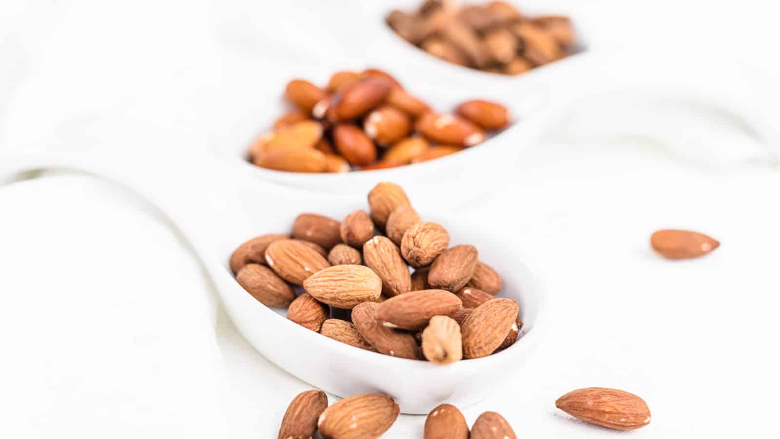 Activated Almonds inside white plates. 