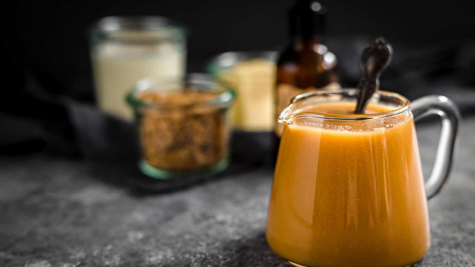 Caramel sauce in a glass. 