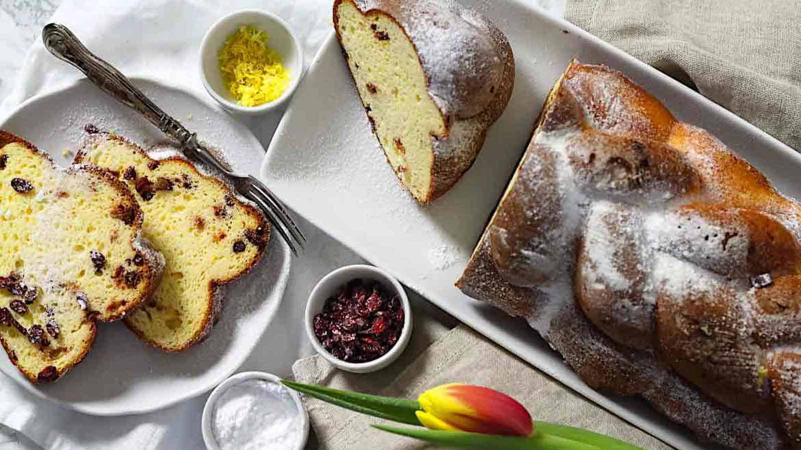 Sweet Keto Challah Bread on a white plate with tulips. 