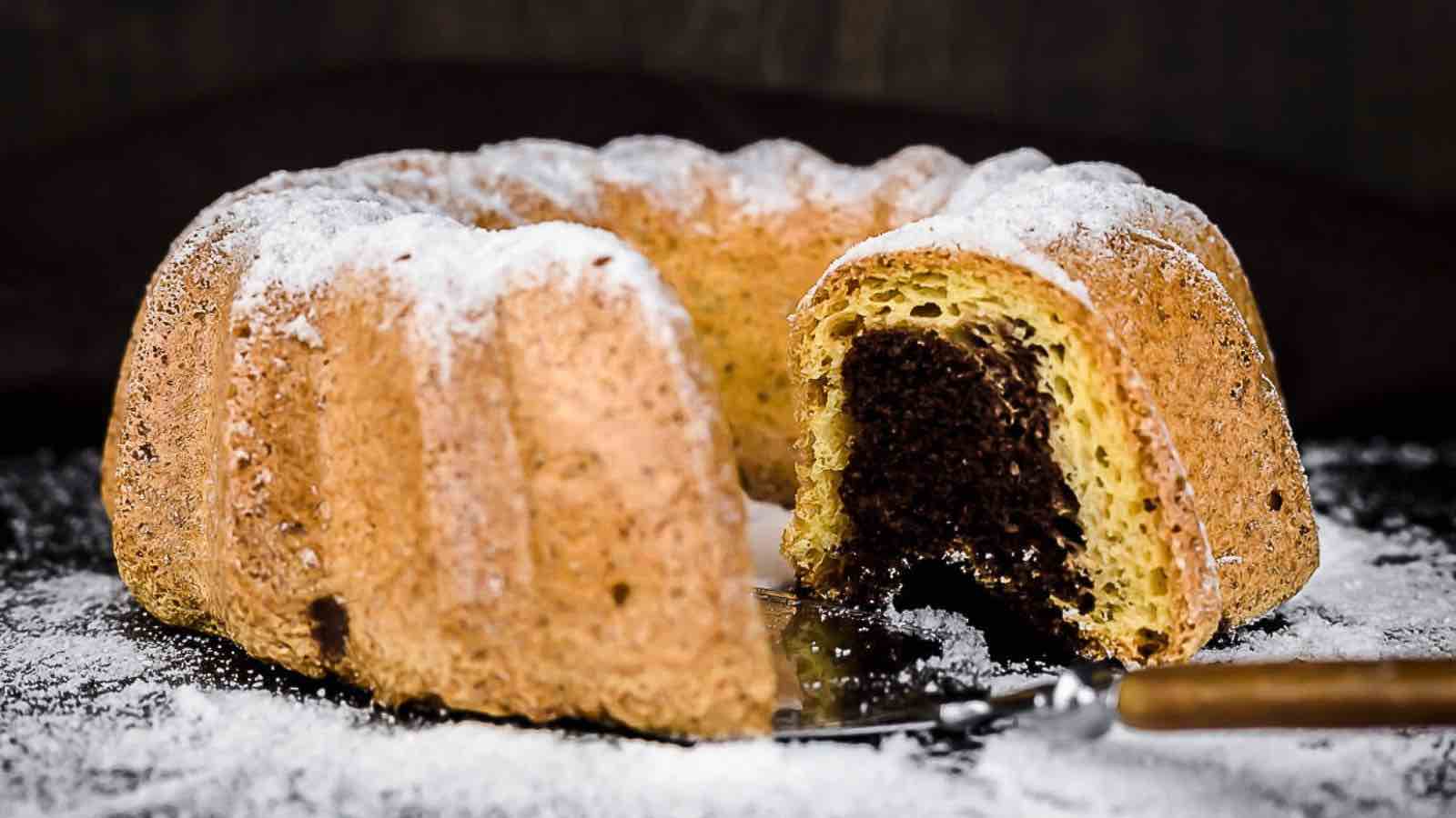 A bundt cake with a slice taken out of it.