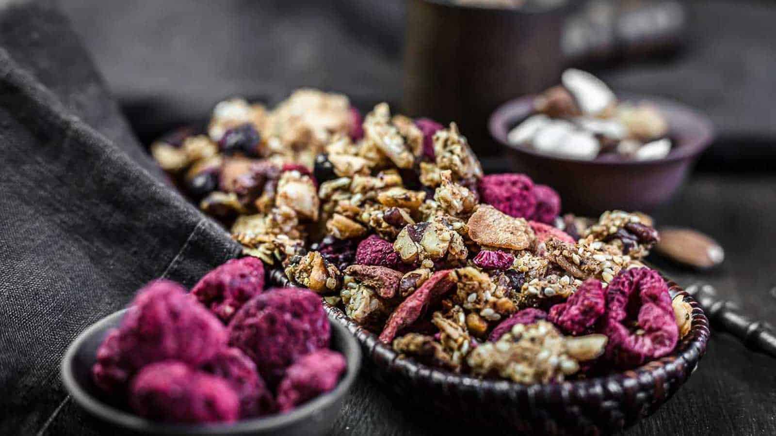 Muesli Granola with dry berries inside brown basket. 