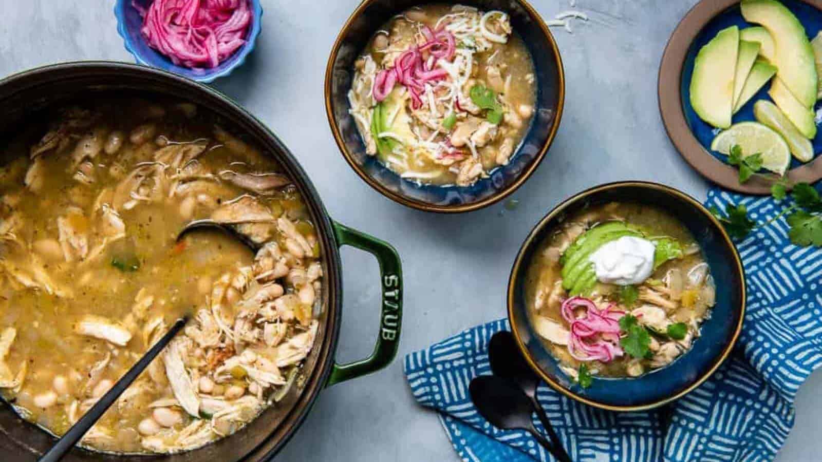 Salsa verde in a bowl with cilantro leaves on top.