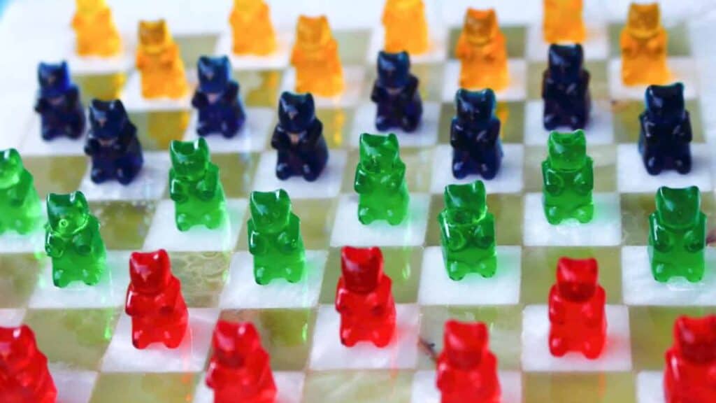 Gummy Bears on a checkered board.