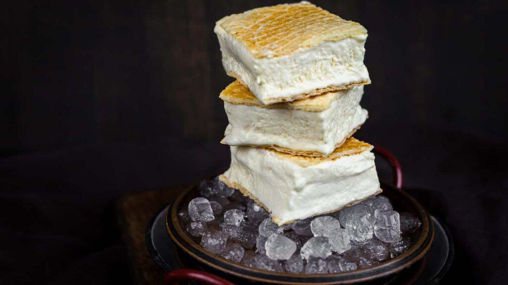 Sugar-Free Ice Cream Sandwich layered on top of ech other on ice.