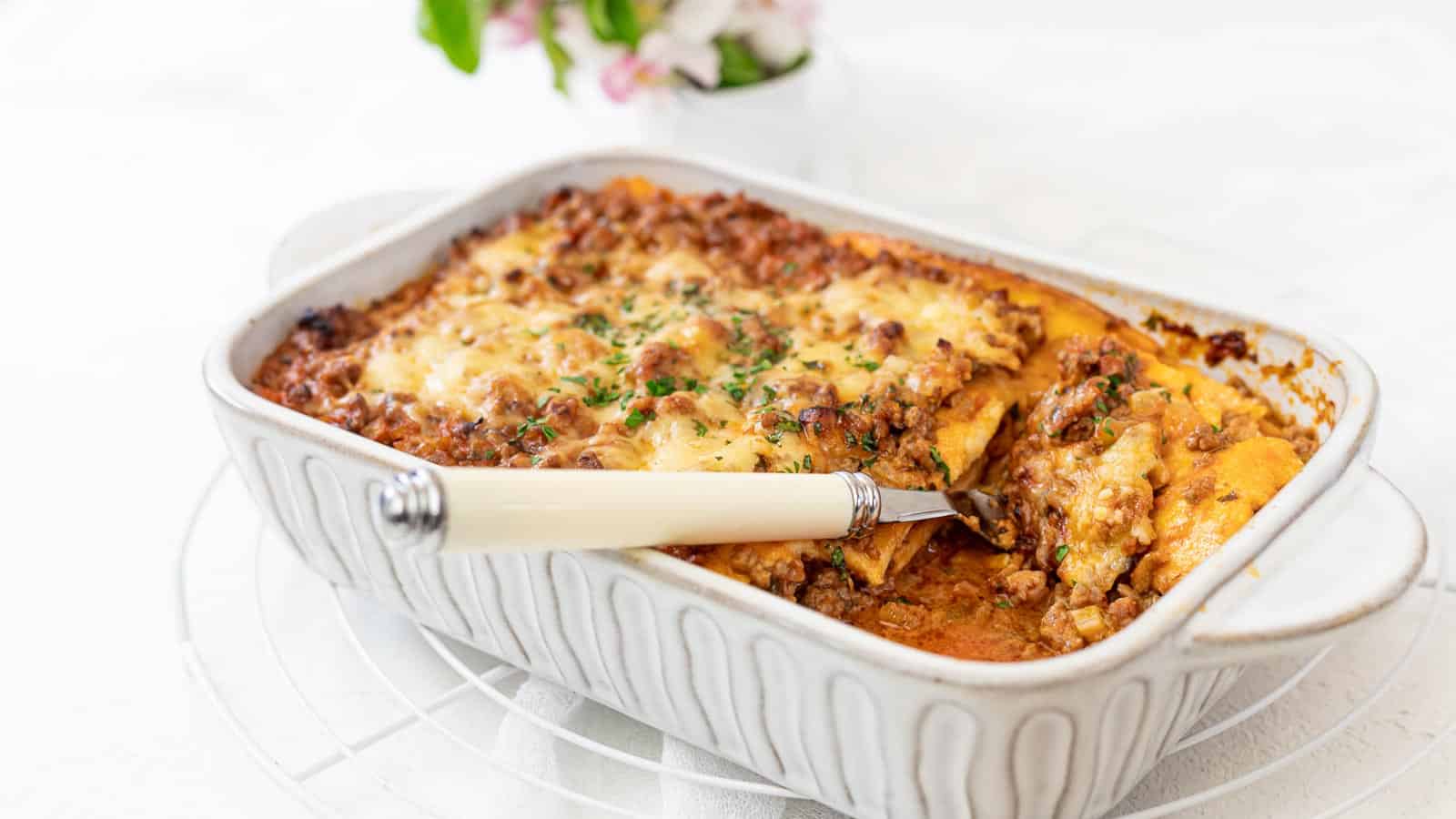 Lasagna inside casserole.