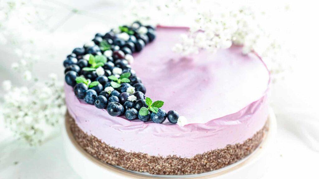 No Bake Blueberry Cheesecake with blueberries on top.