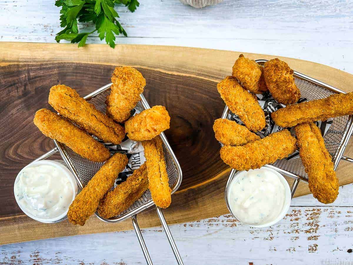 A top down shot of 2 baskets of air fryer Chicken Fries.