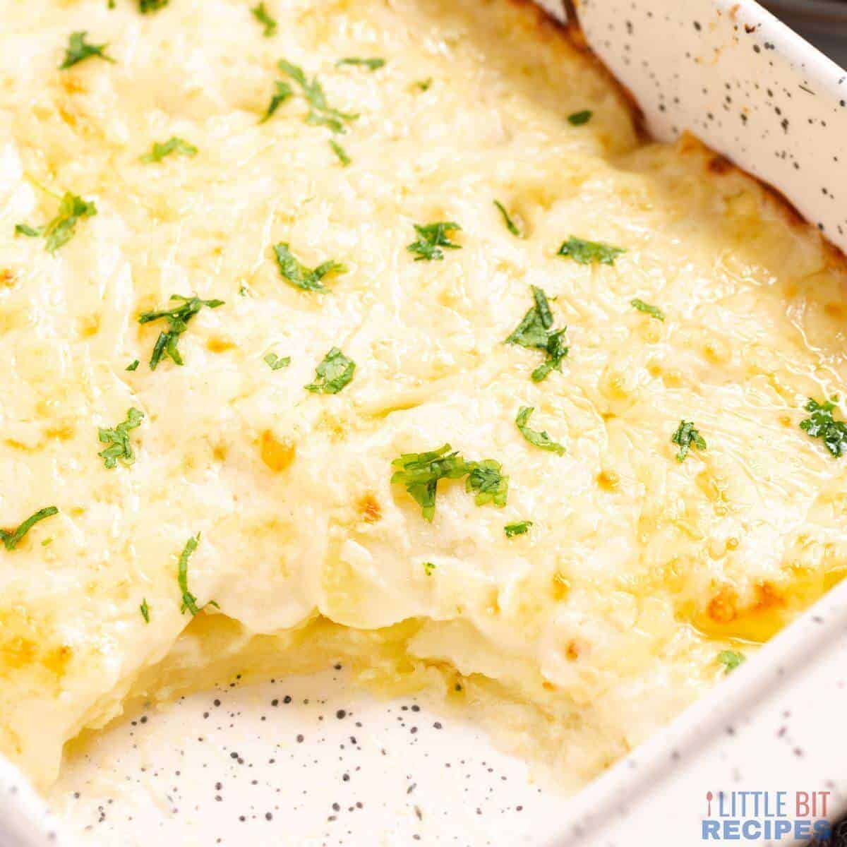 Small baking dish with scalloped potatoes.