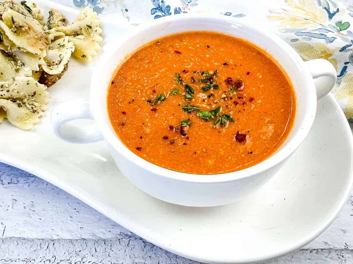 Two bowls of soup on the counter.