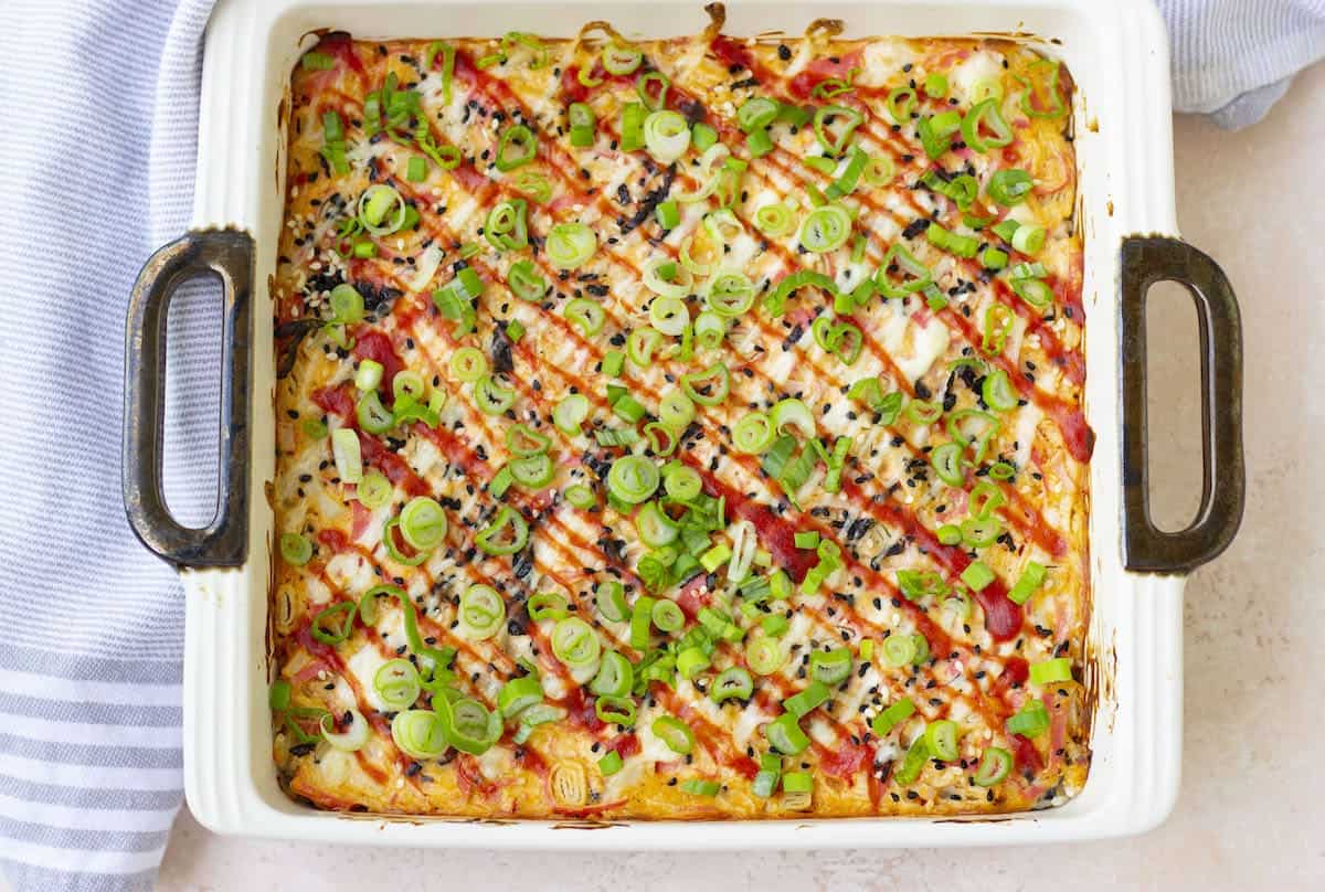 A casserole dish filled with vegetables.