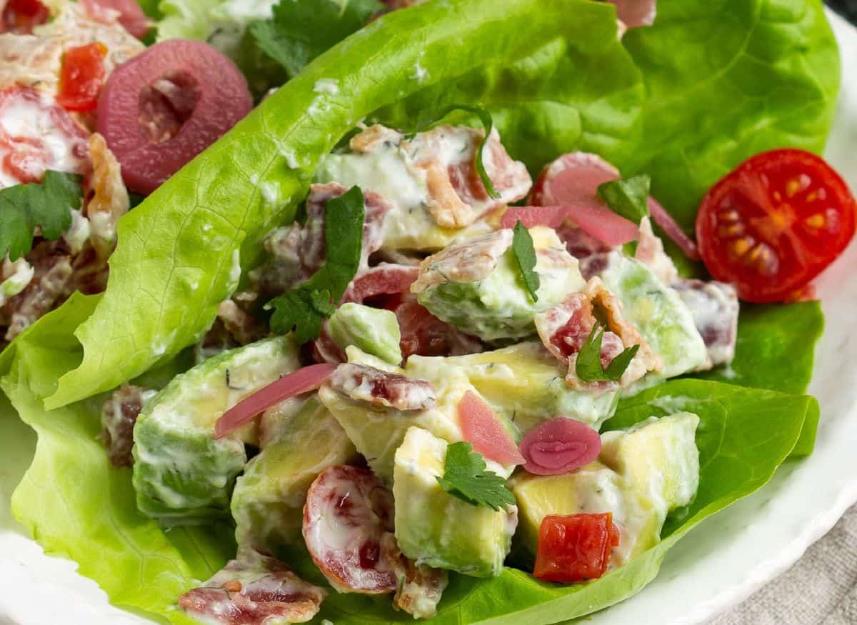 Bibb lettuce Wraps filled with avocado, tomatoes, and bacon