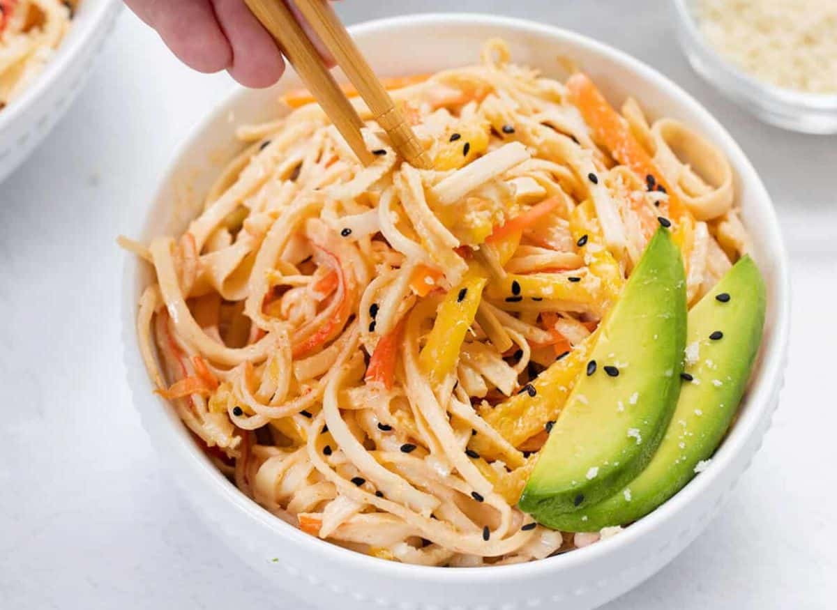 Kani salad in a white bowl.