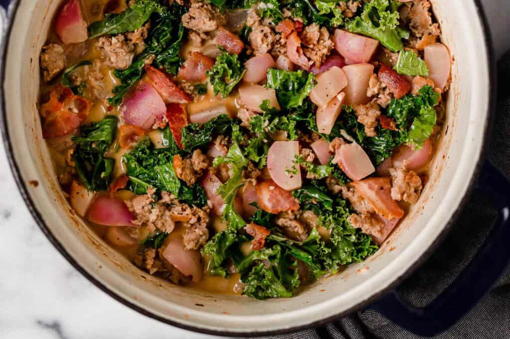 Keto zuppa Toscana with meat, kale and onions.