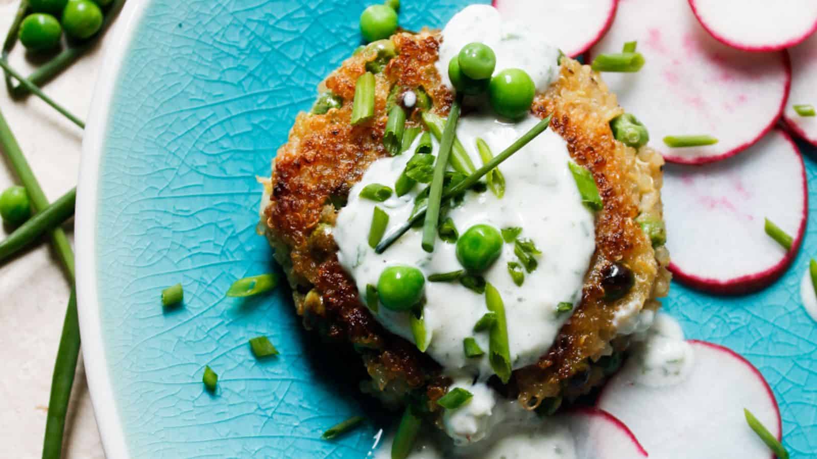 A plate with radishes and peas on it.