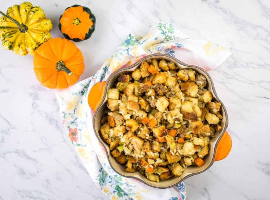 Sausage stuffing in a red pot.