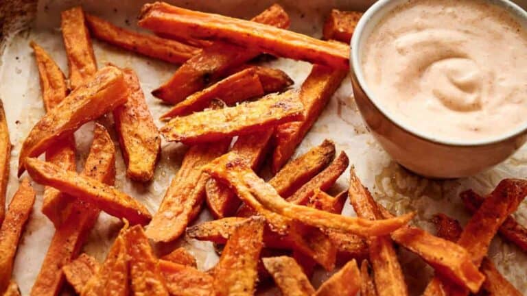 Sweet potato fries with a dipping sauce.