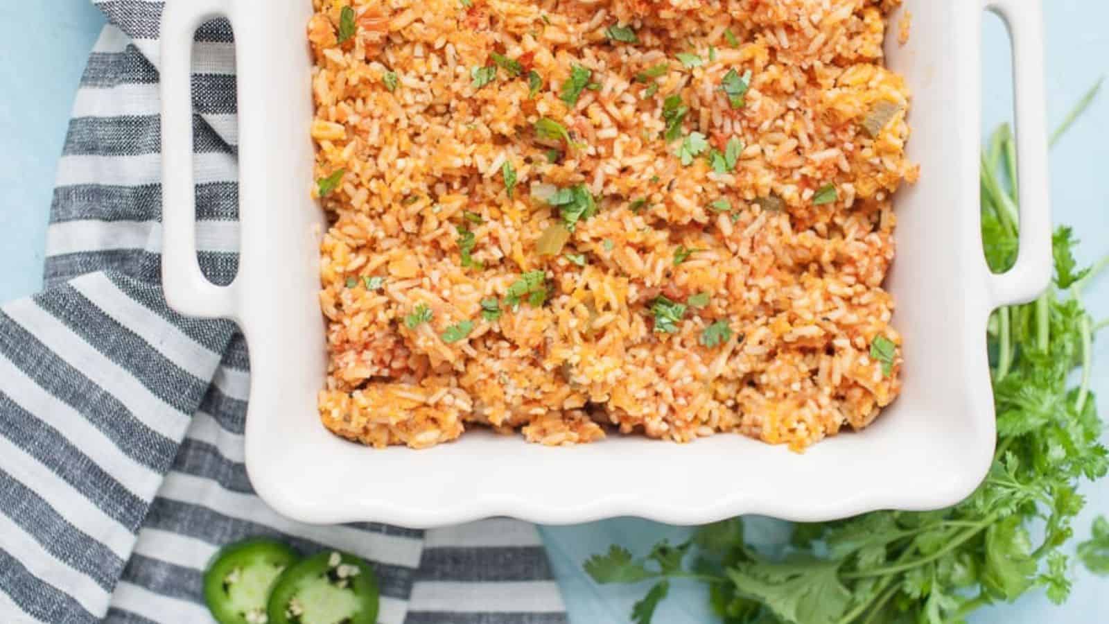 Mexican rice in a white casserole dish.