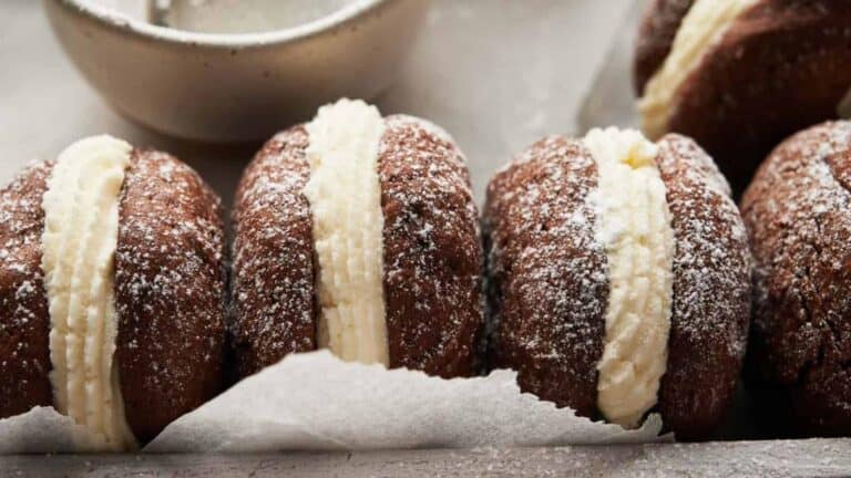 Chocolate cookies with cream and powdered sugar.