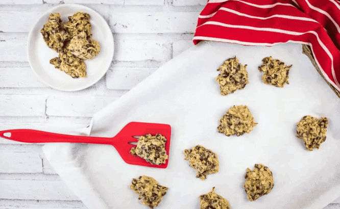 Zucchini Cookies on a parchment-lined tray.