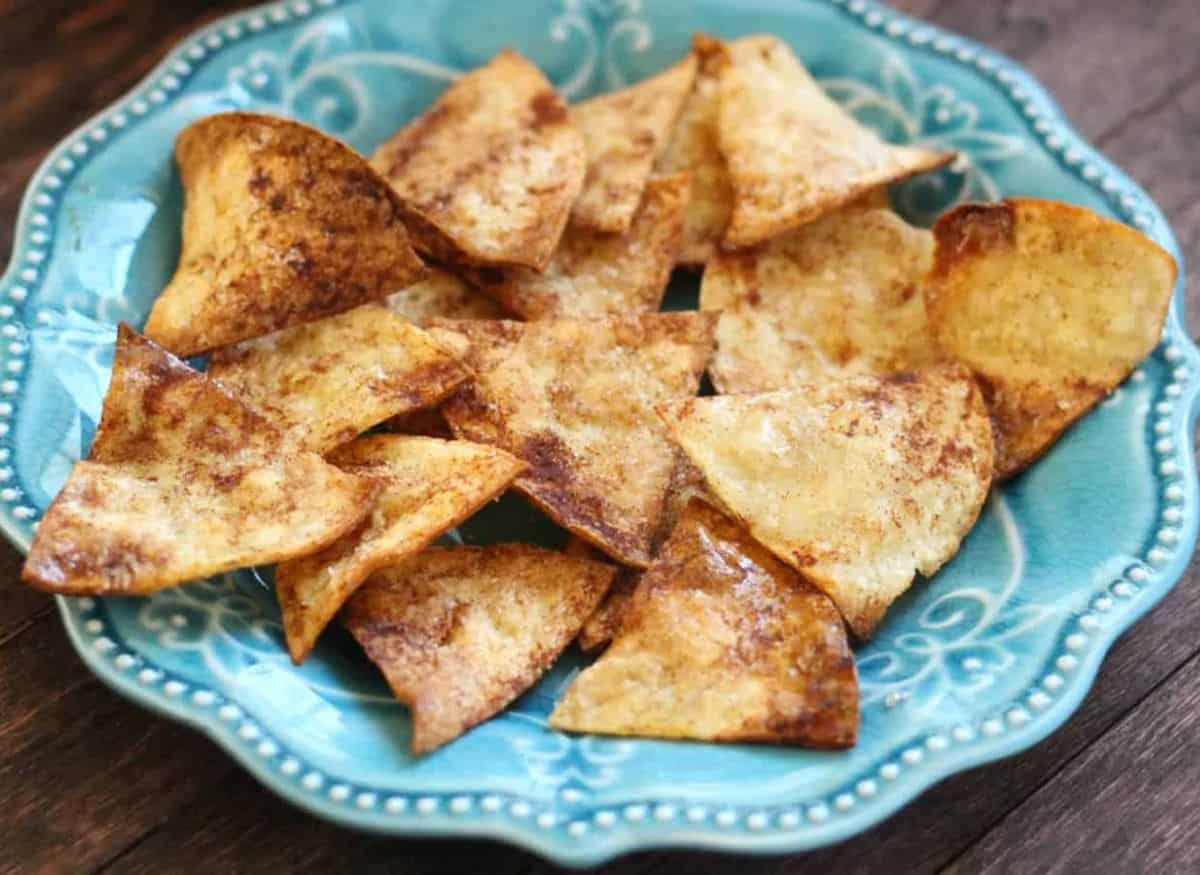 Cinnamon chips on a blue plate.