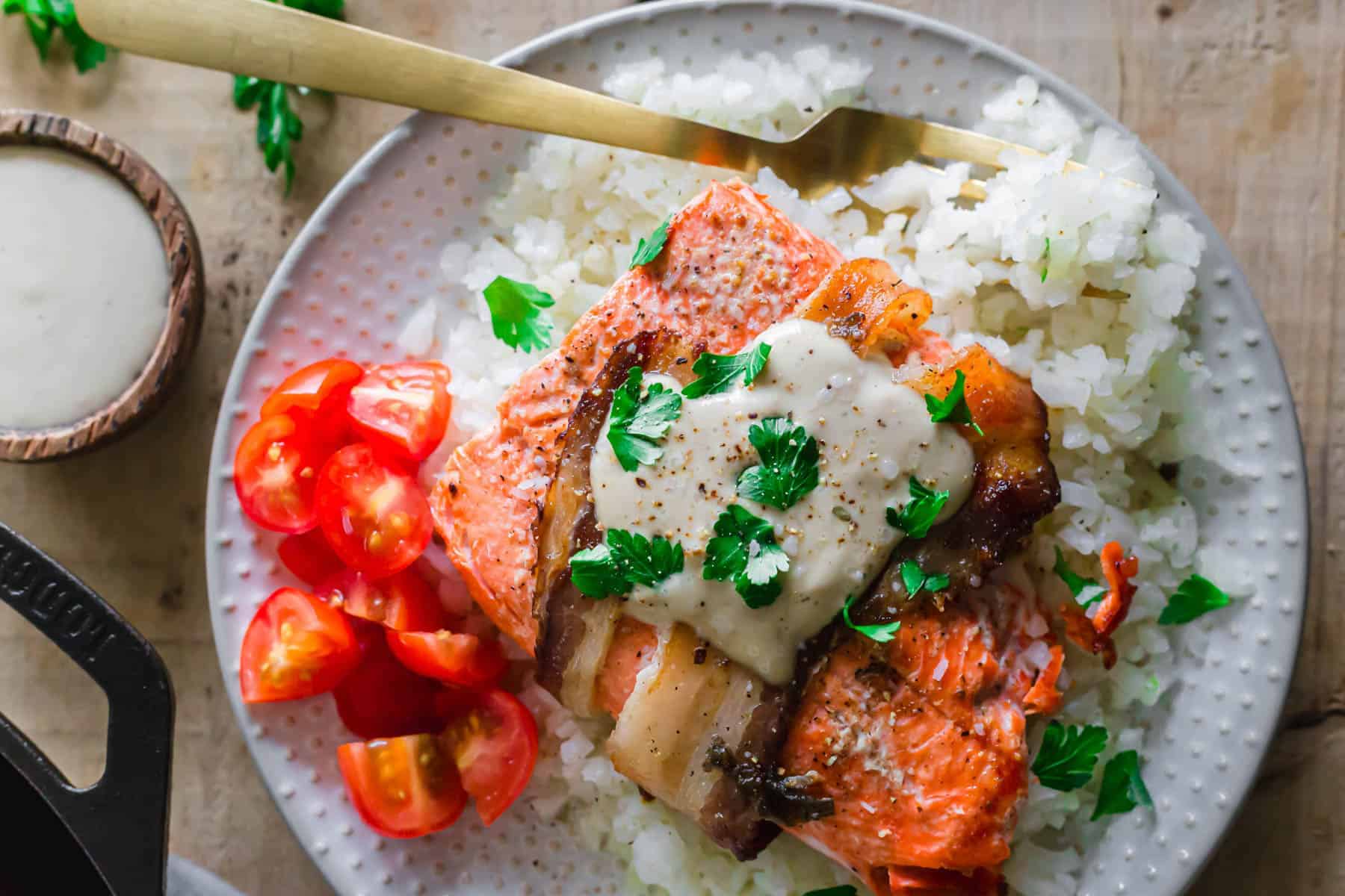 Plate of salmon with bacon.