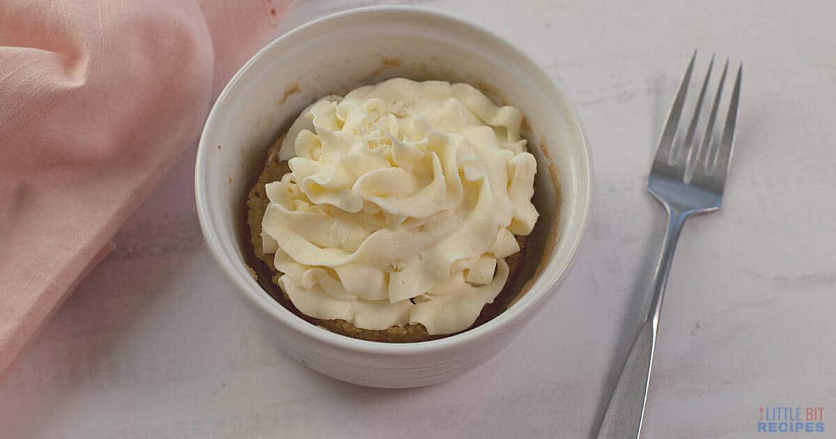 Cake mix mug cake with cream cheese frosting.