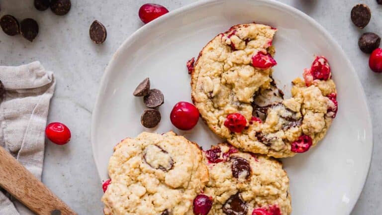 Cranberry chocolate chip cookies on a plate.