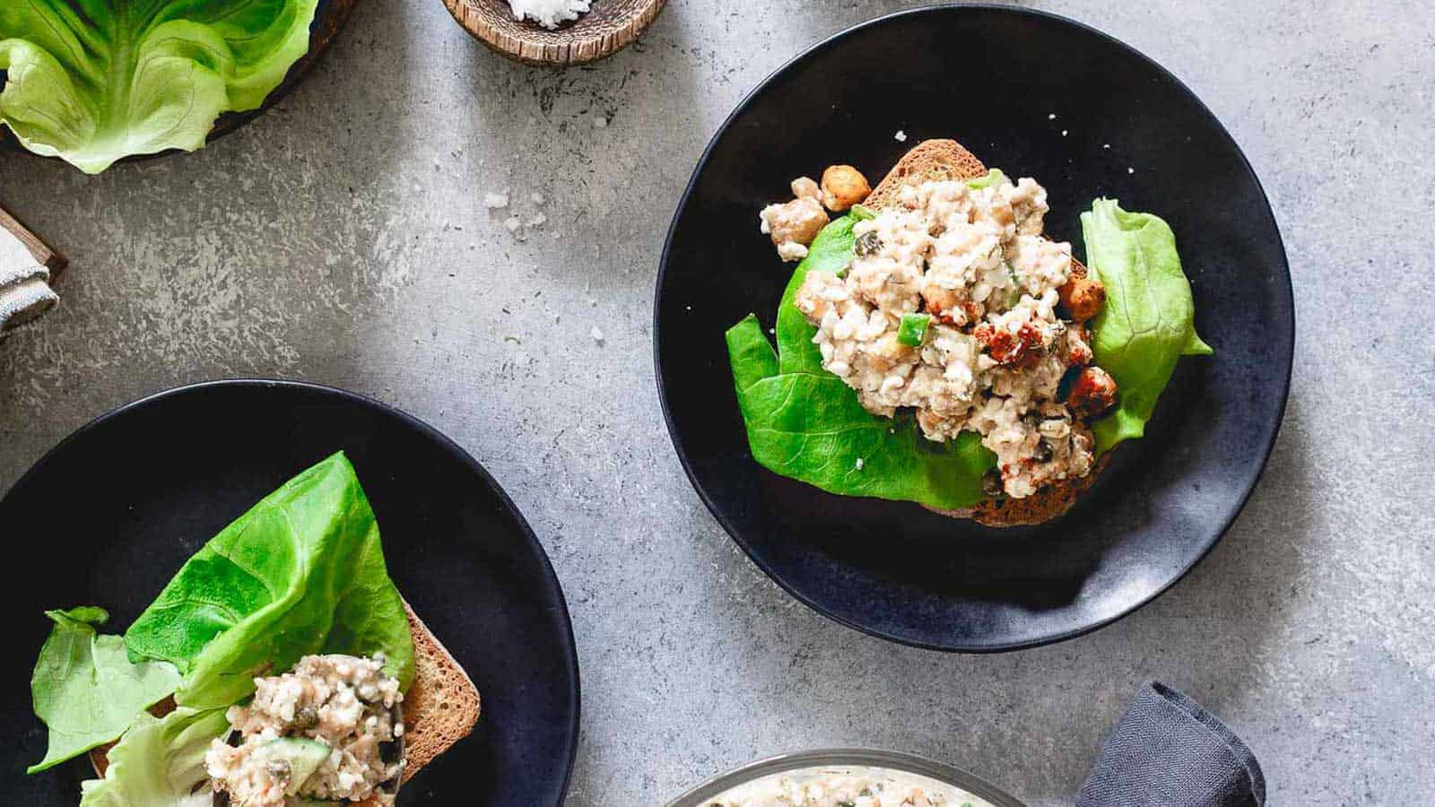 Dijon dill salmon salad with roasted chickpeas on a lettuce wrap.