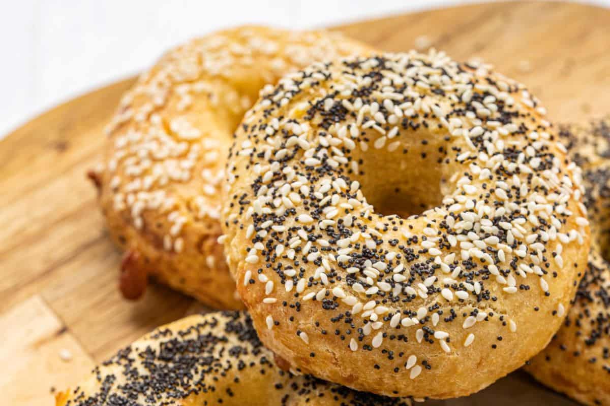 Bagels on a cutting board.