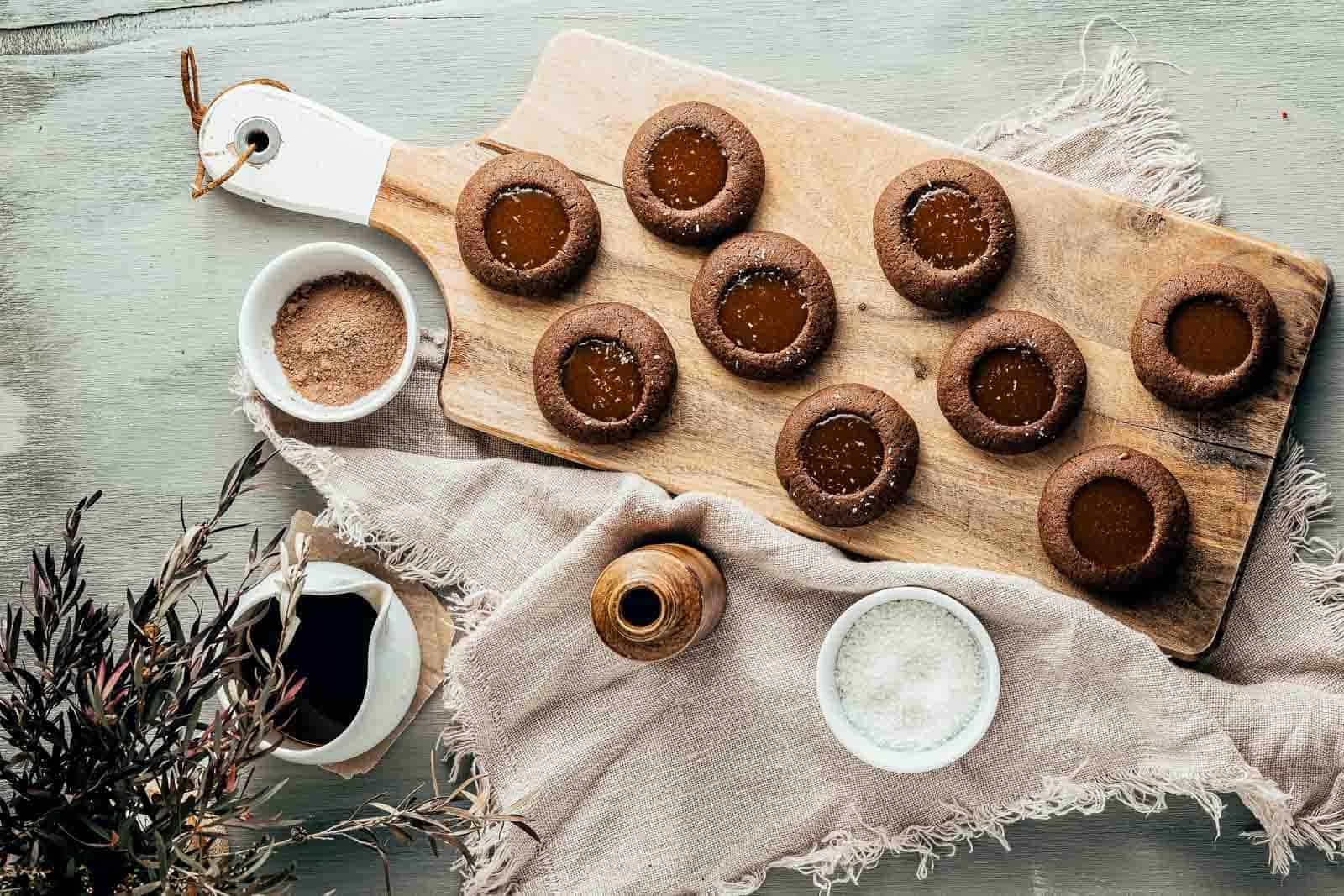 Overhead image of caramel chocolate thumbprint cookies.