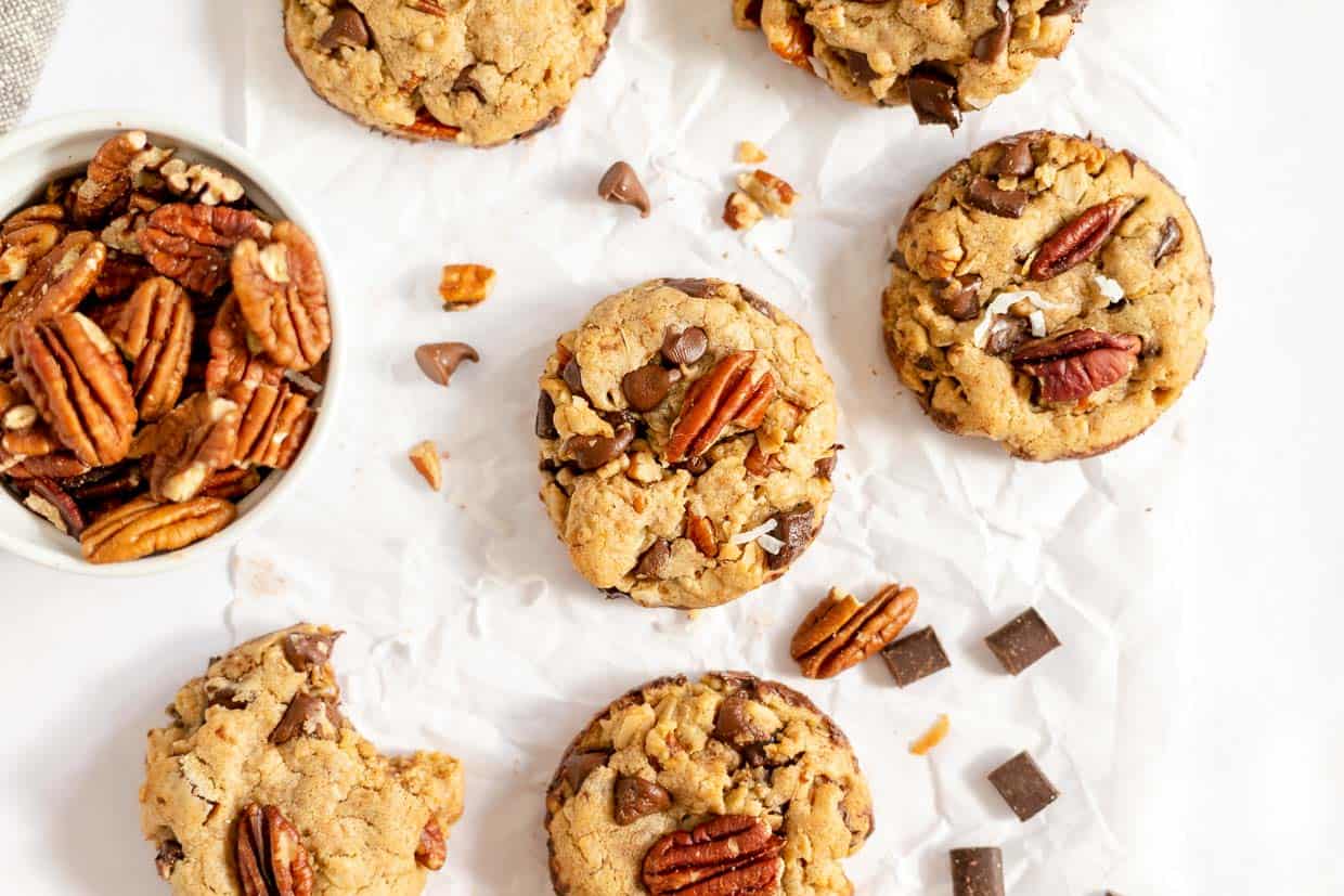 Cookies stacked on a wood tray.