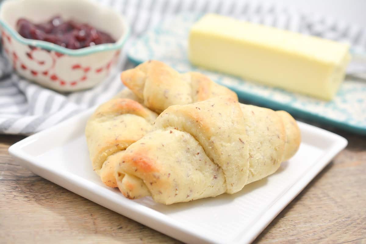 Croissants on a white plate.