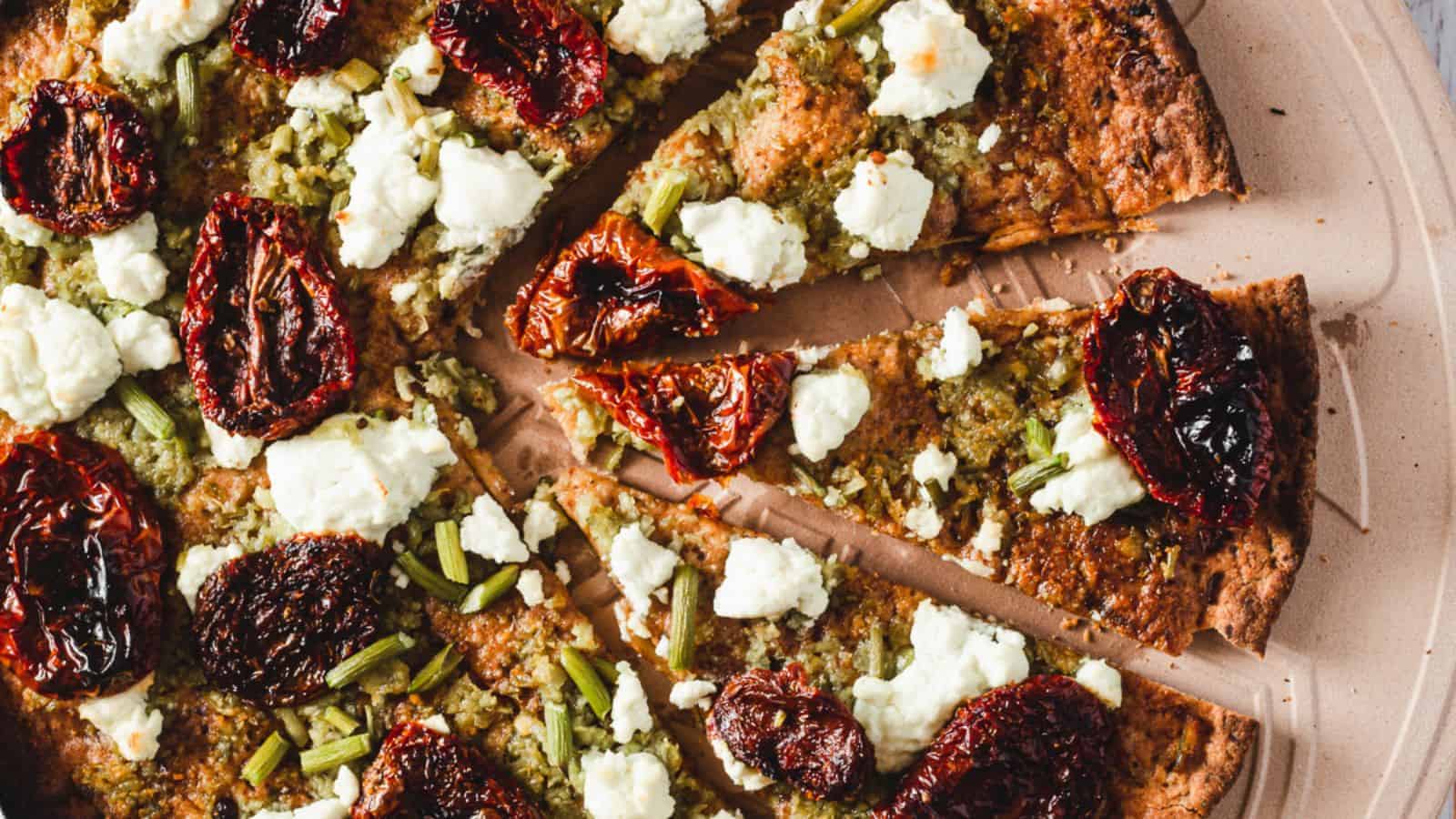 Overhead of garlic scape pesto pizza.