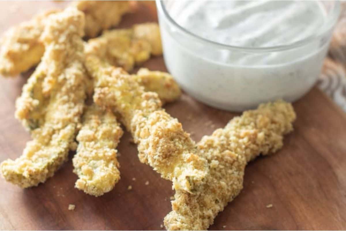 Fried pickles on a cutting board.