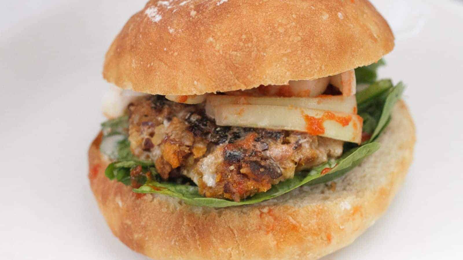 Side view of yam burger with onion.