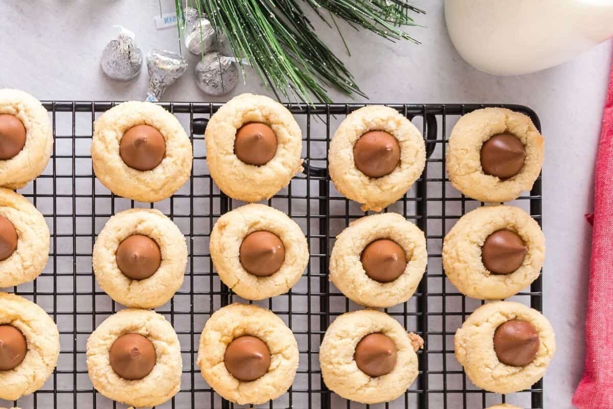 Hershey Kiss Shortbread Cookies lined on a wire cooling rack.