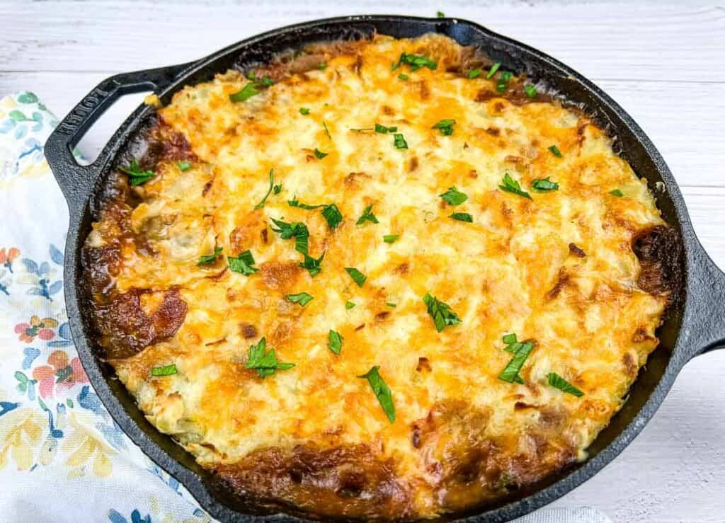 Leftover Roast Beef Shepherd's Pie in a cast iron dish.