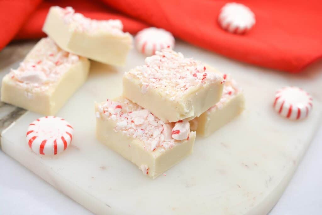 Peppermint fudge on a cutting board.