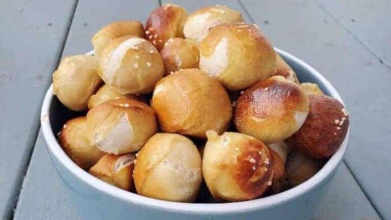 Image shows a bowl filled with homemade Pretzel Bites.