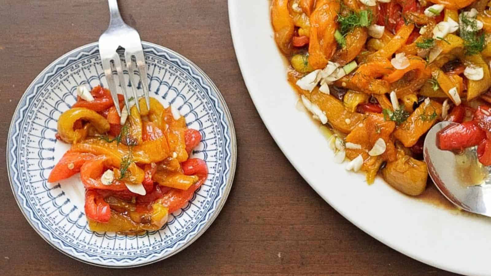 A plate of vegetables with a fork next to it.