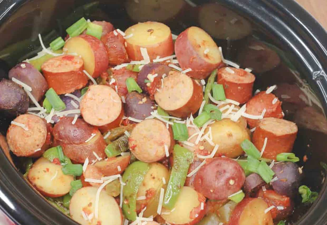 Potaotes and sausage in a crock pot.