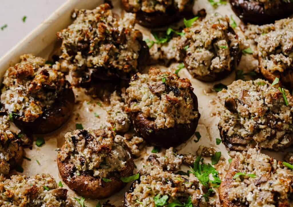 Stuffed mushrooms on a serving tray.