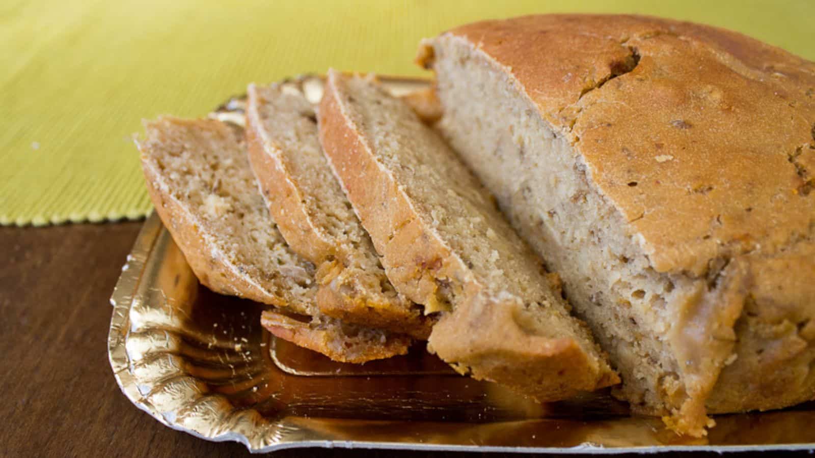 A loaf of bread is sitting on a tray.