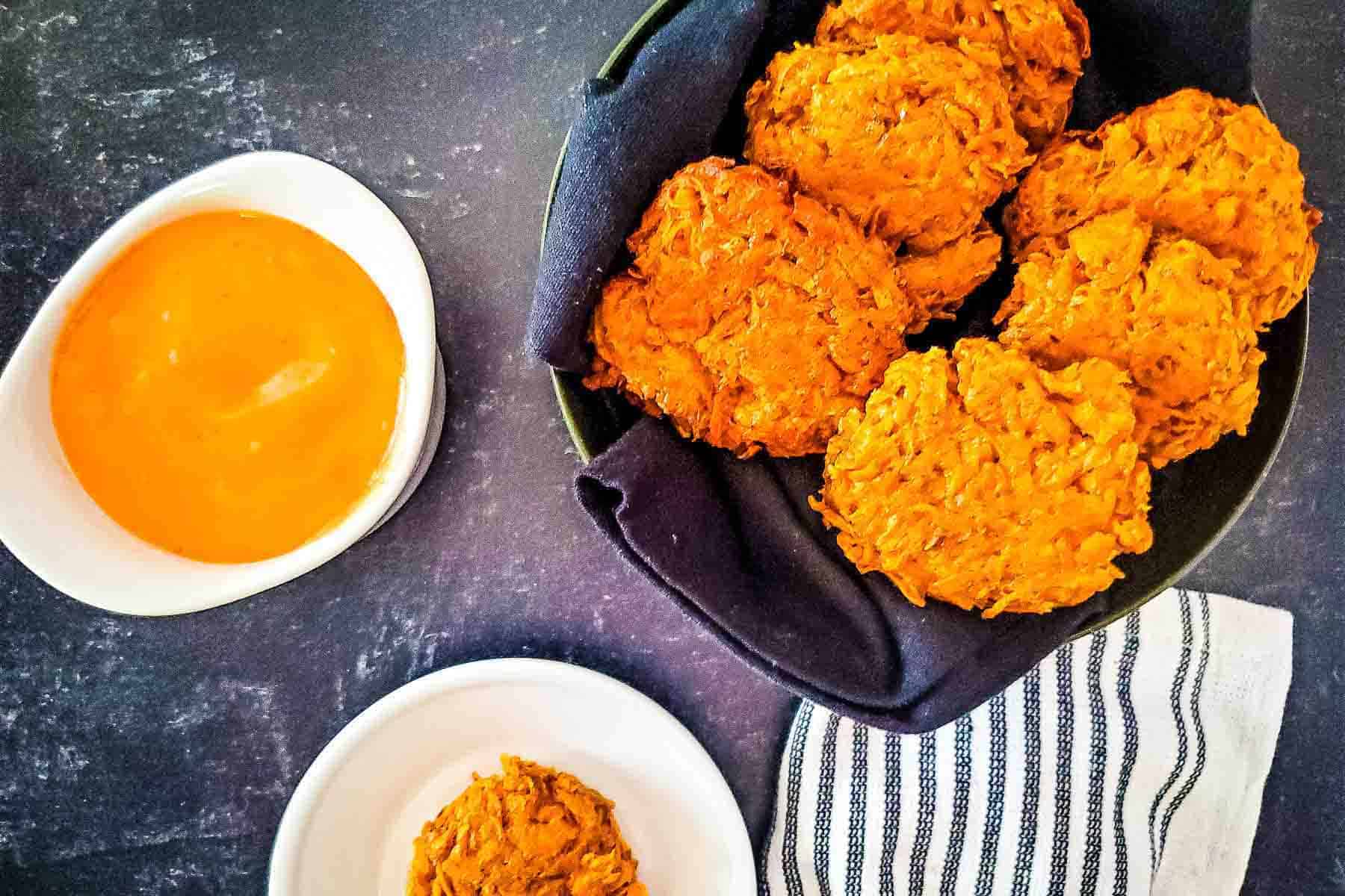 A festive plate with a bowl of dipping sauce next to it, perfect for holiday appetizers.